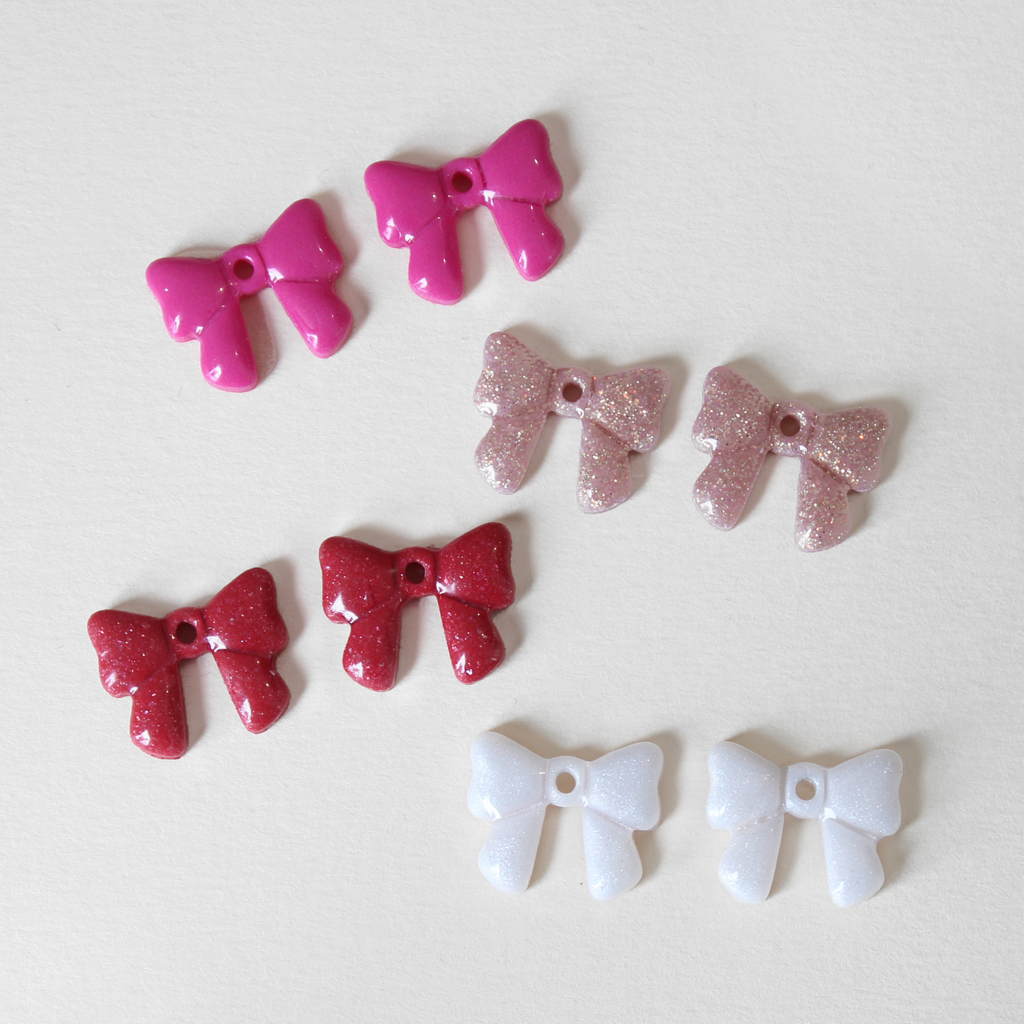 Charms Noeud - plusieurs coloris