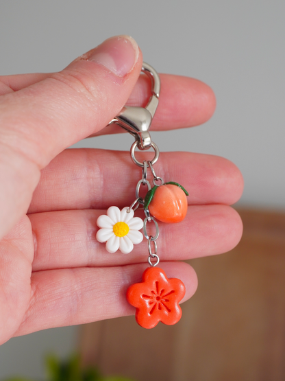 Porte-clés fleur orange
